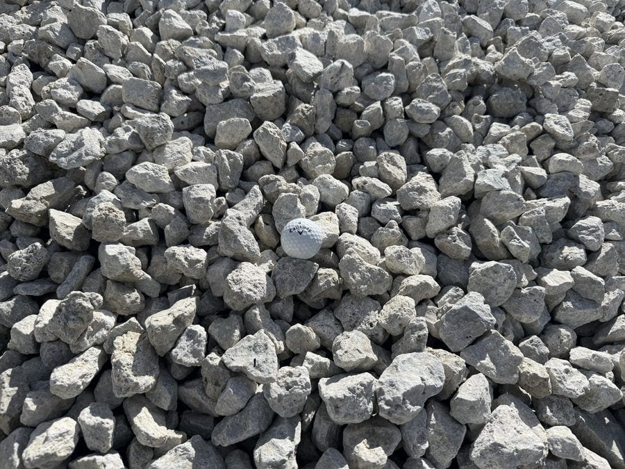 Angular white and cream limestone, roughly golf-ball sized.